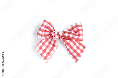 Red ribbon bow in the box isolated on white background