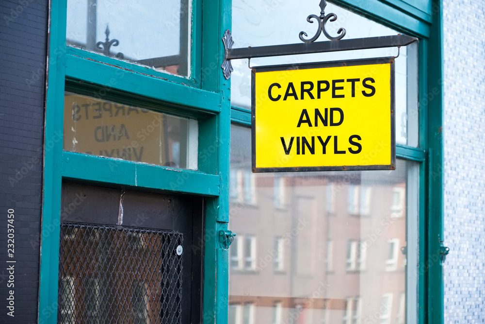 Fototapeta premium Carpets and vinyl plastic flooring for the house shop sign uk