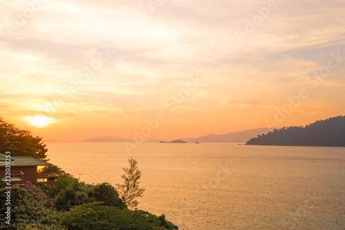 Beautiful of sunset with colorful sky in summer time concept travel, holiday and vacation. Tropical paradise beach nature landscape at Lipe island in Thailand.