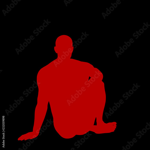 Man sitting on the ground. ...