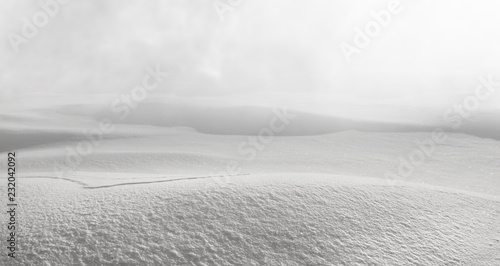 Winter landscape. Winter natural background with snowdrifts in gray tones