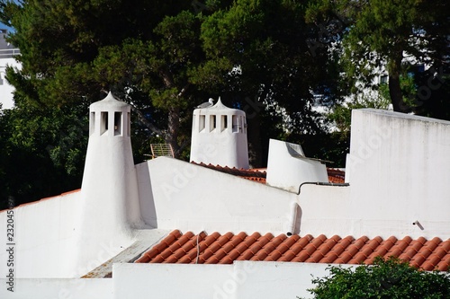 Traditional white Portuguese chimneys, Albufeira, Portugal.
