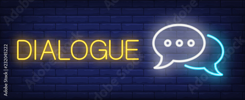 Dialogue neon sign. Glowing inscription with speech bubbles on dark blue brick background. Can be used for chatting, internet, apps, messengers, smartphones
