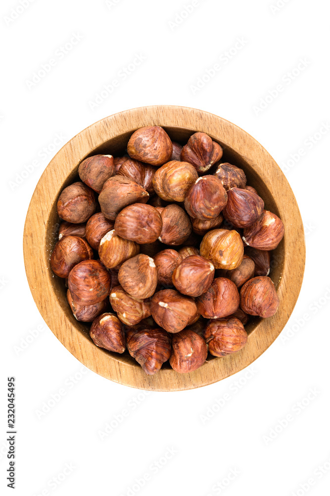 Pile of whole unshelled hazelnuts isolated Pile of whole unshelled hazelnuts isolated