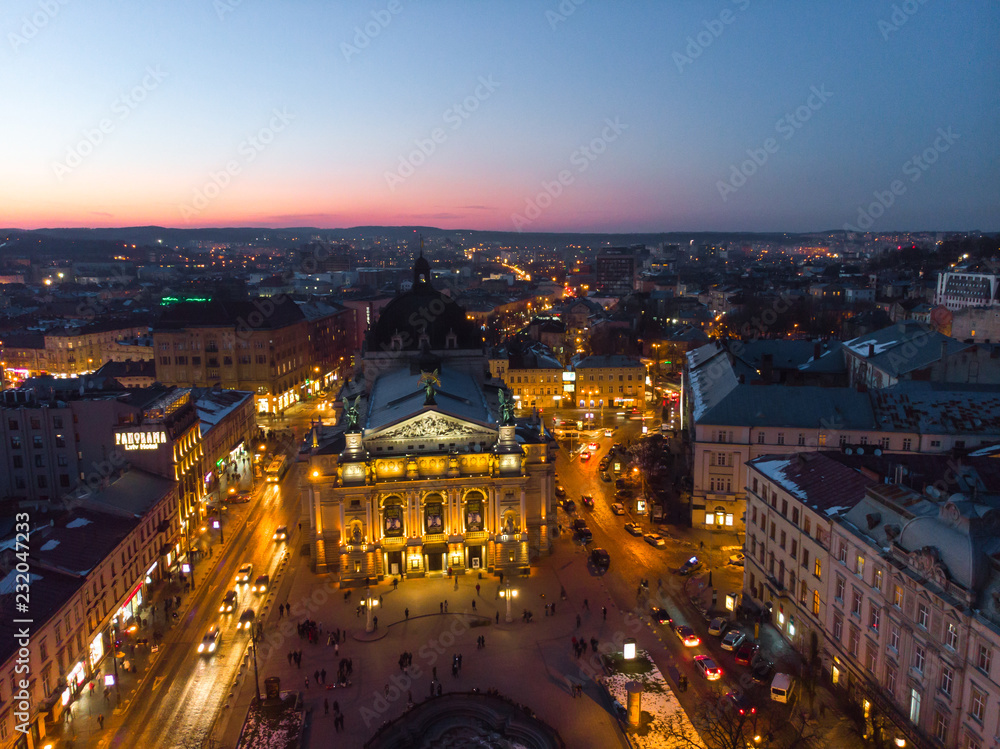 aerial view of city in night time. streets in car lights. aerial view of city in night time. streets in car lights.