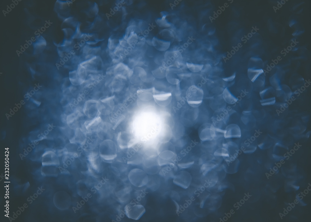 Fototapeta premium Abstract blue lights bokeh blurred background