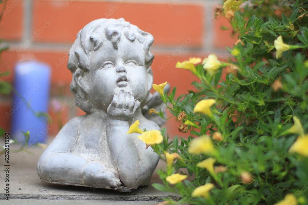 statue of baby angel