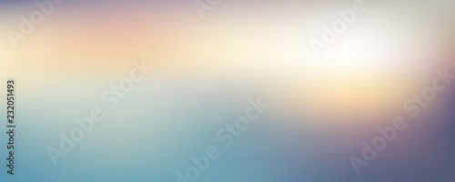 Abstract blurred gradient twilight background. Colorful sky with sunlight.