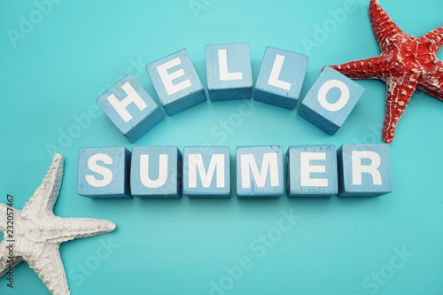 Hello Summer alphabet letter and marine decoration on Blue background