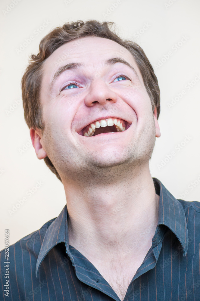 Smiling blue-eyed man portrait Smiling blue-eyed man portrait