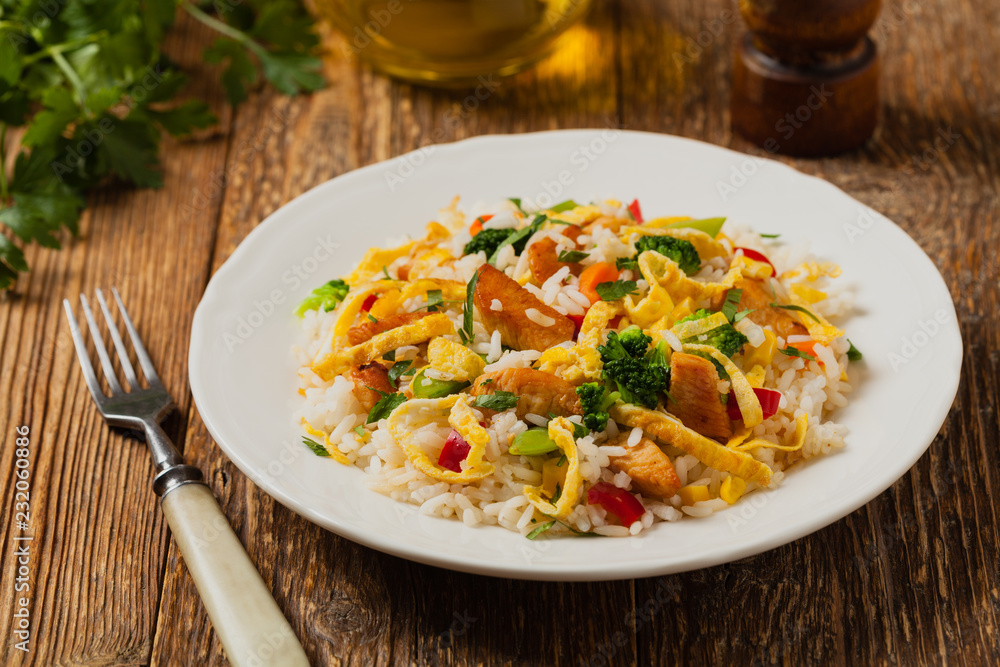 Nasi goreng. Fried rice with egg and vegetables. Nasi goreng. Fried rice with egg and vegetables.