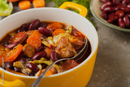 Traditional portuguese goulash with cabbage, beans and ribs.