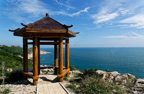 Pagoda pavilion, seashore and blue sky © MaxK