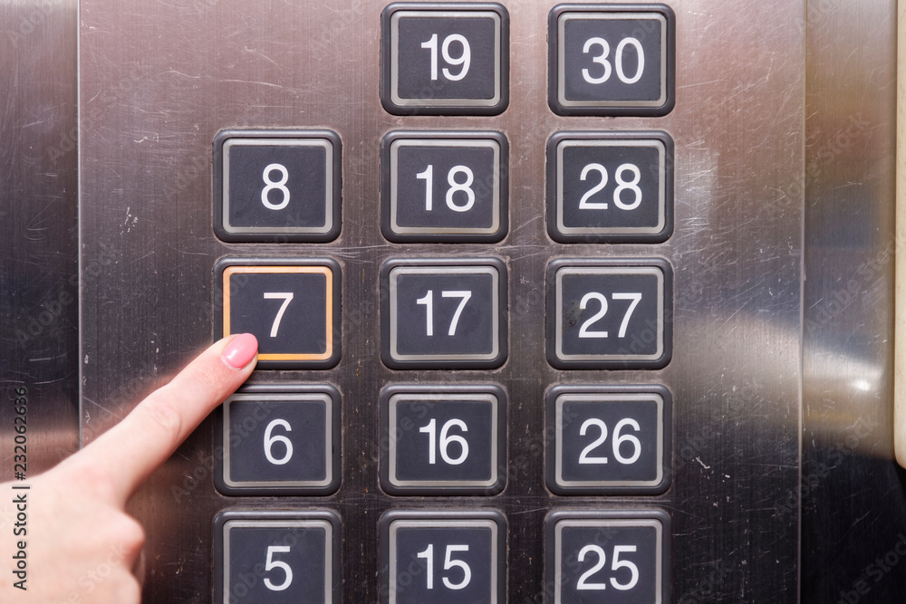 Elevator buttons with finger pushing 7 floor Stock Photo Adobe Stock