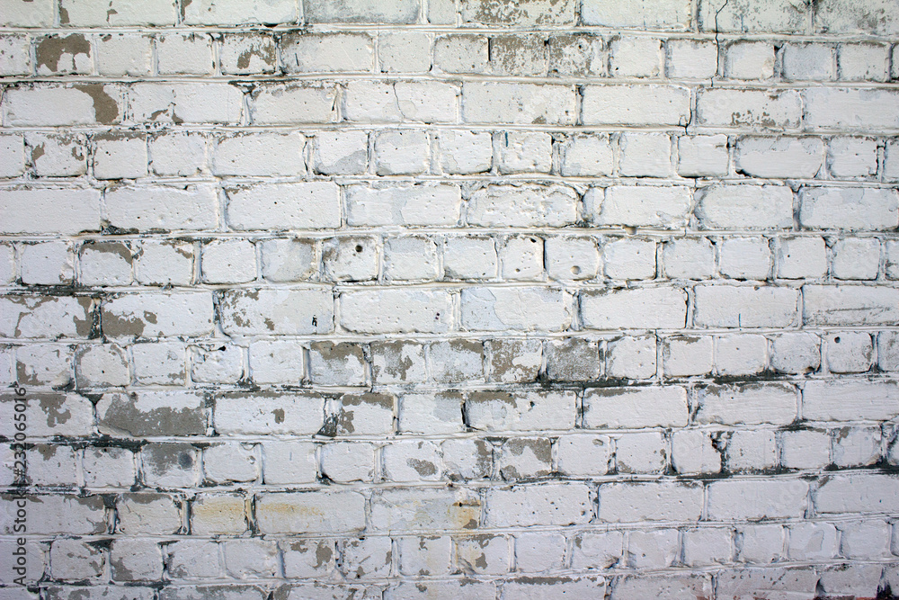 Texture, old brick wall of an abandoned building Texture, old brick wall of an abandoned building