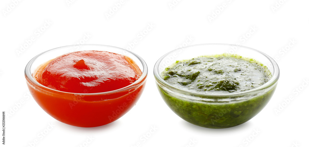 Tasty sauces in bowls on white background Tasty sauces in bowls on white background