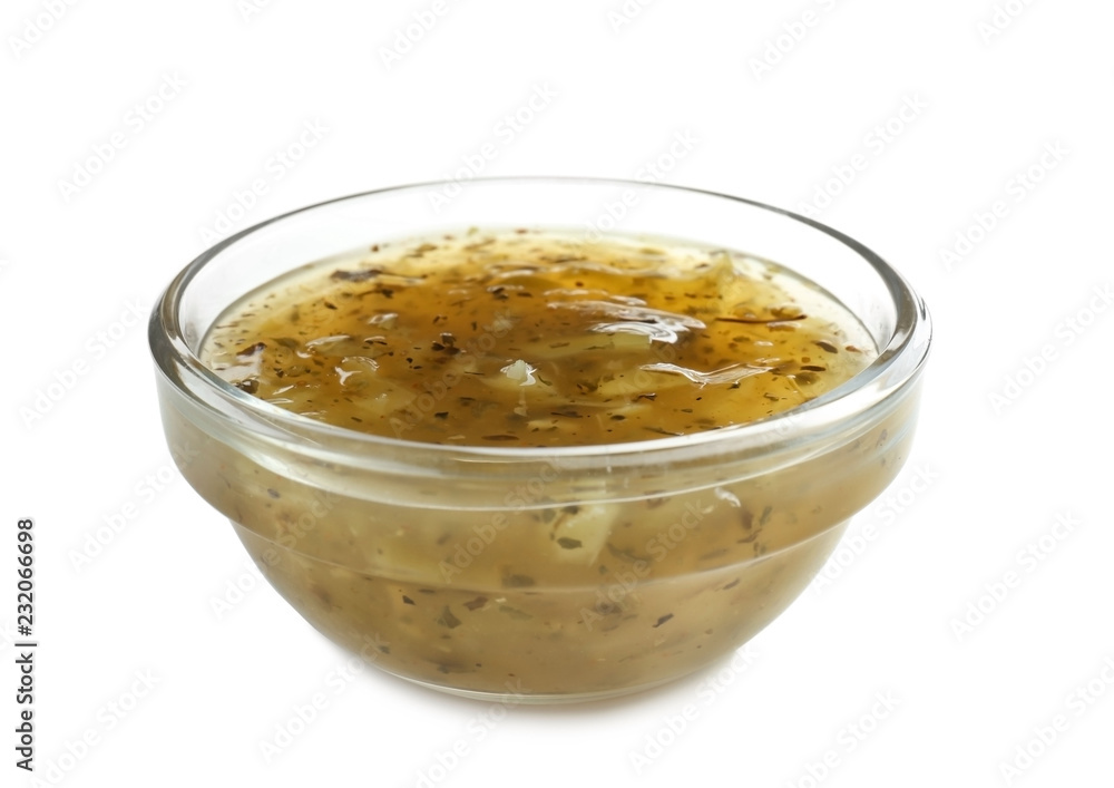Tasty green sauce in bowl on white background Tasty green sauce in bowl on white background