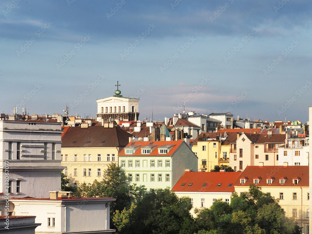 Cityscape, skyline on a sunny day, roofs of Prague, Czech Republic. Church of the Most Sacred Heart of Our Lord