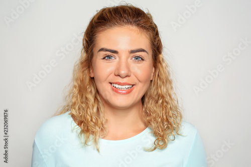 Portrait of happy young wom...