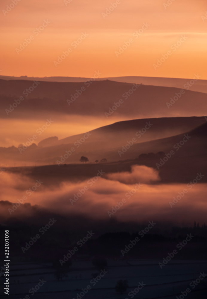 Fototapeta premium misty valley at dawn
