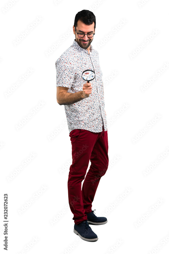 Handsome man with glasses with magnifying glass Handsome man with glasses with magnifying glass