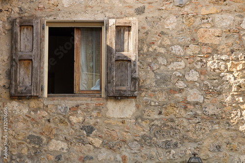 Open window. Detail of a open window of a old house.