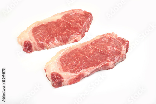 raw beef sirloin steak isolated on white background