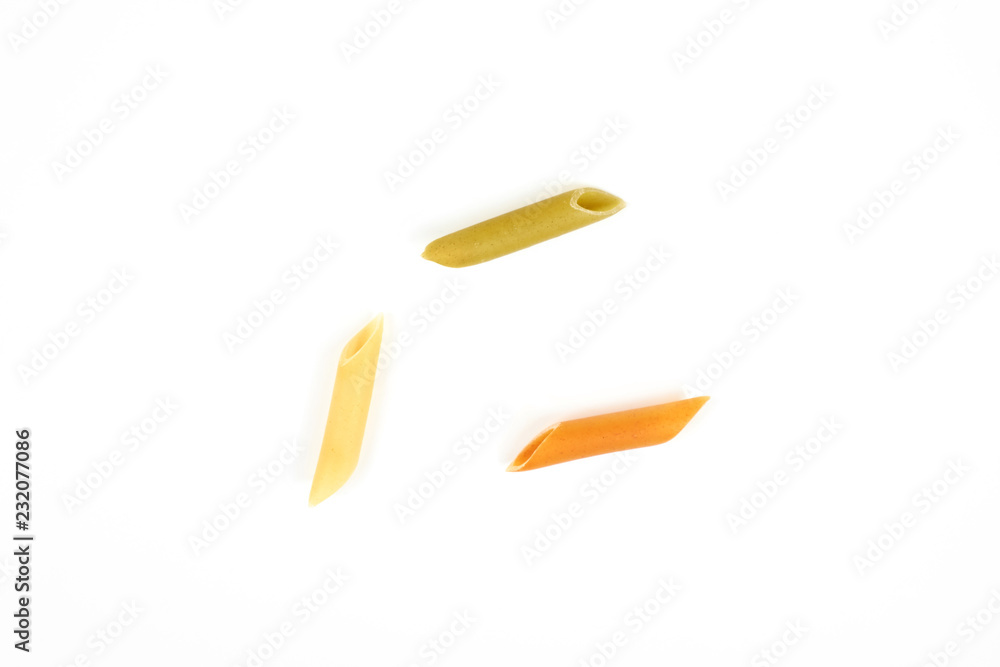 raw penne colorful pasta on white background. raw penne colorful pasta on white background.