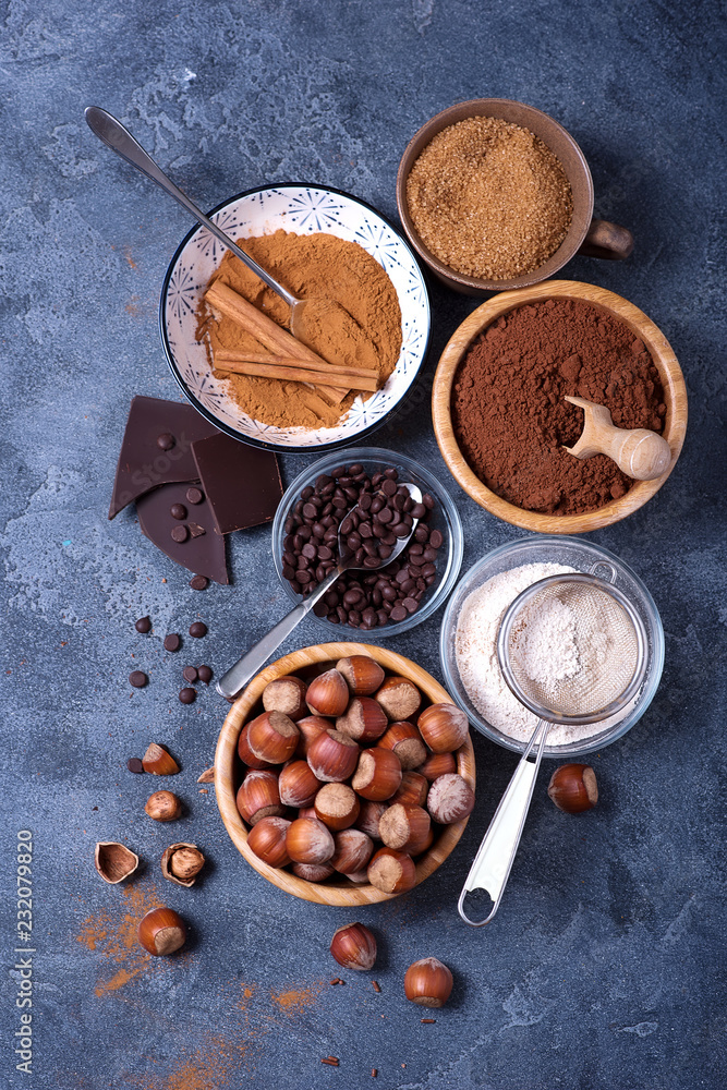 Baking ingredients for a cake with chocolate chips and hazelnuts, baking concept