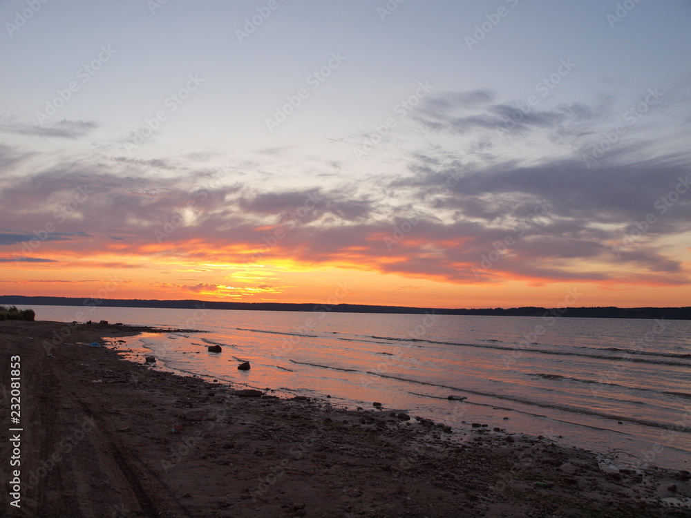 Sunset. On the big river. Summer. Russia, Ural, Perm region Sunset. On the big river. Summer. Russia, Ural, Perm region