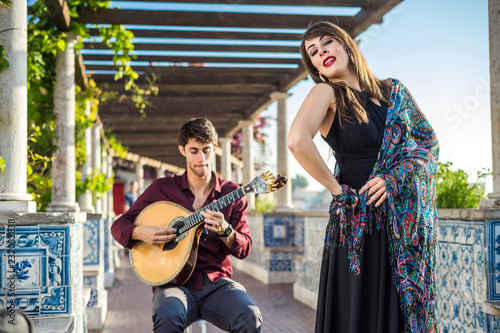 Band performing traditional music fado under pergola with azulejos in Lisbon, Portugal photo