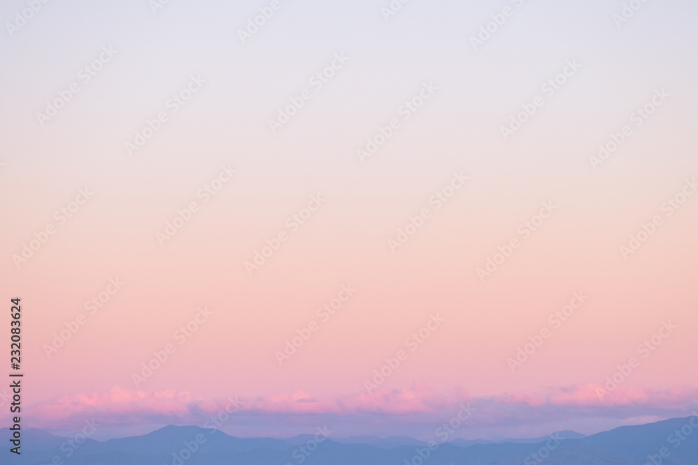 Fototapeta premium Beautiful cloudscape over the sea at sunset.