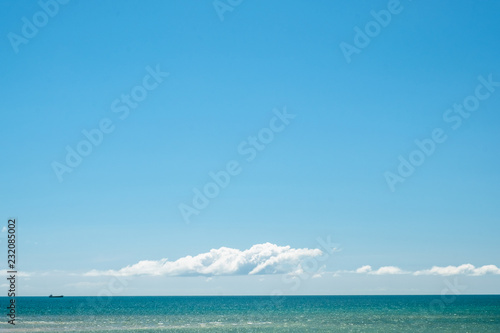 Beautiful blue sky and cloud over the sea.