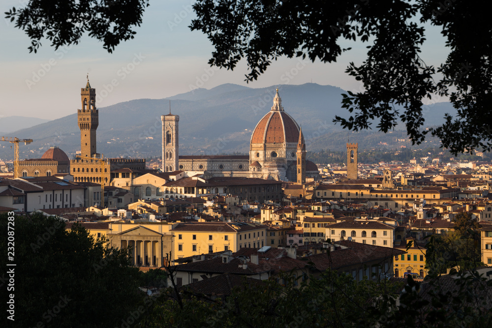 Historical center of Florence, Italy, including Cathedral of Saint Mary of the Flower (Duomo) and the Old Palace, seen from Bardini gardens, at sunset.