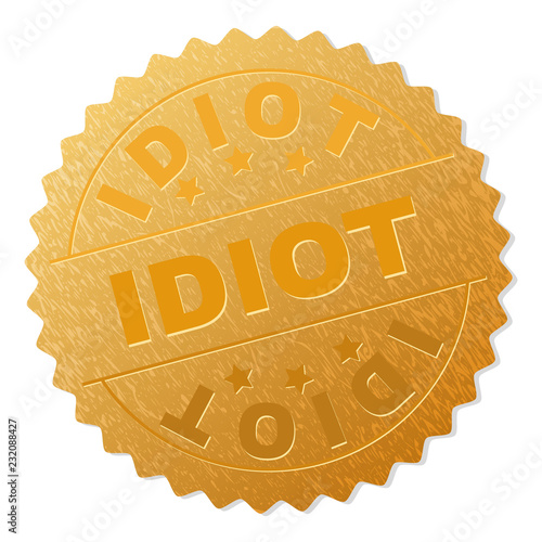 IDIOT gold stamp award. Vector golden award with IDIOT title. Text labels are placed between parallel lines and on circle. Golden skin has metallic effect.