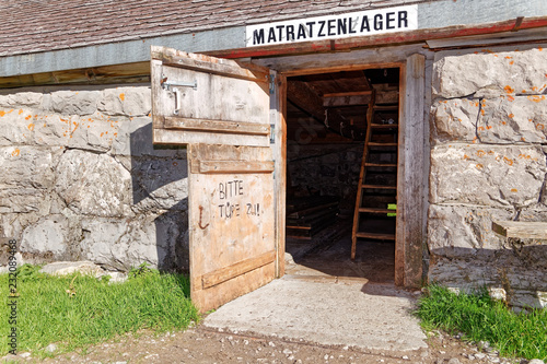 Entrance to emergency shelter at Fählenalp (Faehlenalp) by Fällensee (Faellen Lake) - Alpstein, Appenzell Alps, Switzerland photo