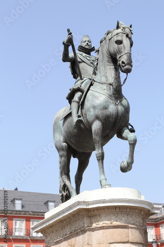 The metal statue of Felipe III riding a horse by Giambologna and Pietro Tacca in the Main Square (Plaza Mayor) of Madrid, Spain