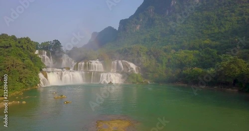 Beautiful waterfall. Ban Gioc waterfall or Detian waterfall is landmarks name of two waterfalls in border Cao Bang, Vietnam and Daxin County, China. Amazing landscape for travel in Vietnam and China photo