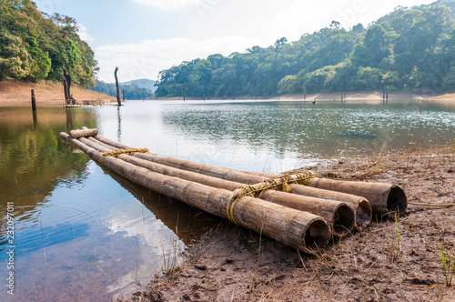 Scenic waterscape with bamboo raft in Periyar National Park, India. photo