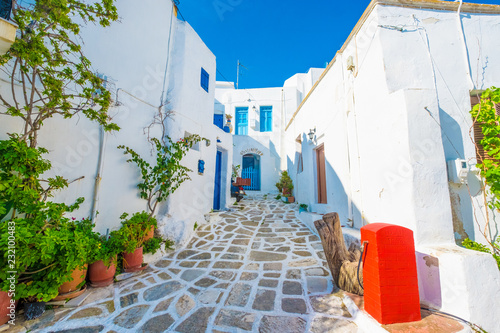 Old traditional white houses on the street in Lefkes village, Paros, Greece