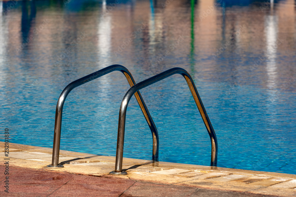 Swimming Pool with a Steel Ladder