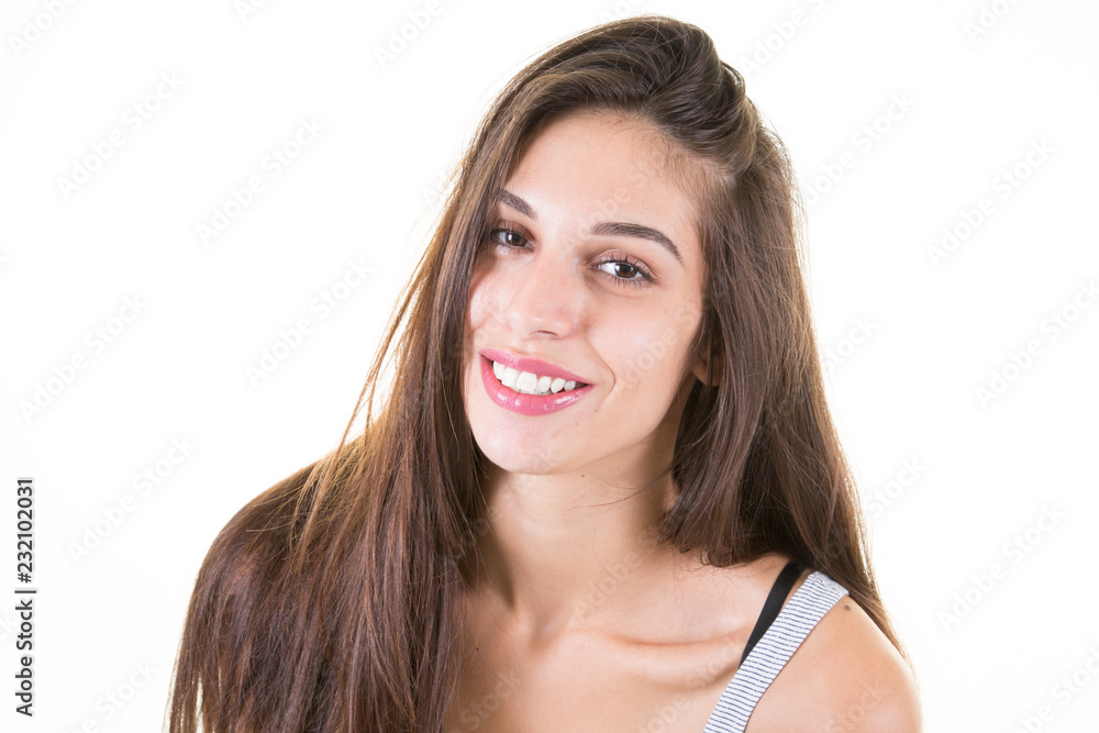 Young Beautiful Woman Looking at the Camera smiling on white Background Young Beautiful Woman Looking at the Camera smiling on white Background
