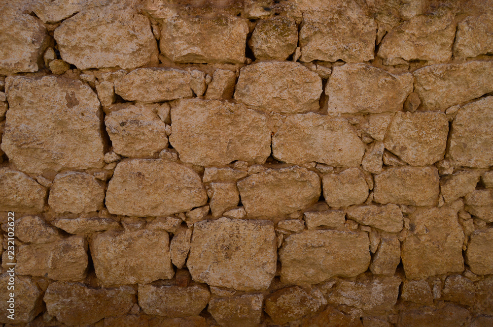 Old Stone wall which is made in a small village. Old Stone wall which is made in a small village.