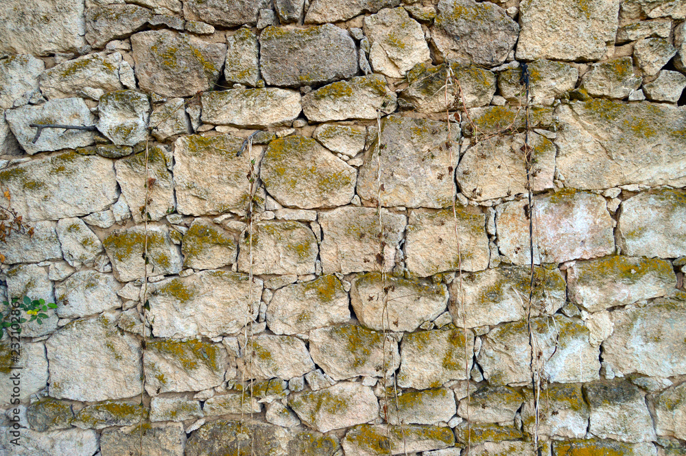 Old Stone wall which is made in a small village. Old Stone wall which is made in a small village.