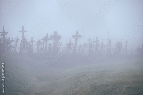Hill of Crosses in the mist. photo
