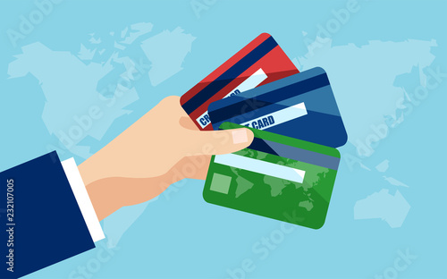 Vecotr of a business man hand holding credit cards.