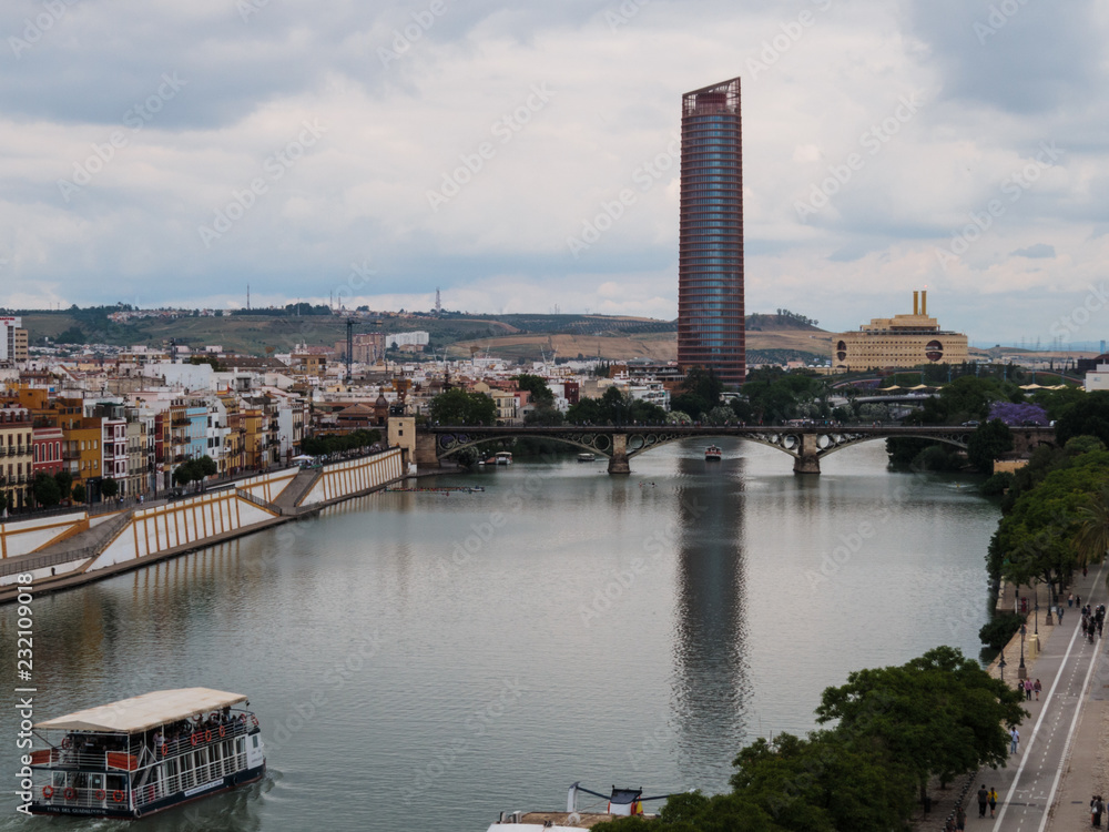 Seville skyline with river Guadalquivir and tower