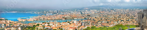 Fototapeta Naklejka Na Ścianę i Meble -  Aerial panoramic view of old port and Marseille city. France