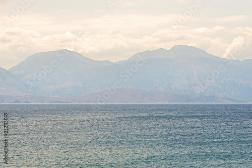 Sea in the morning, mountain landscape background