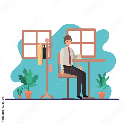 man drinking coffee in the dining room